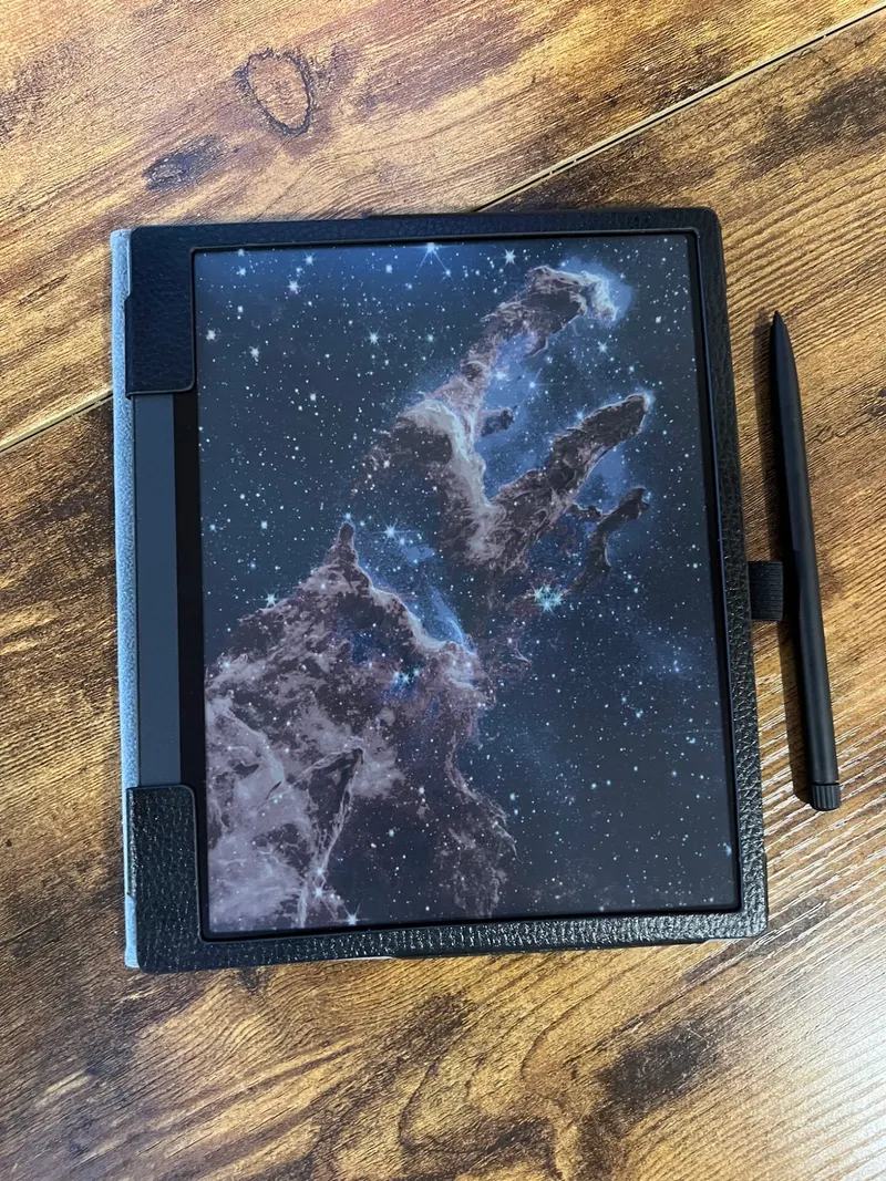 Color e-ink tablet showing the Pillars of Creation, with its stylus